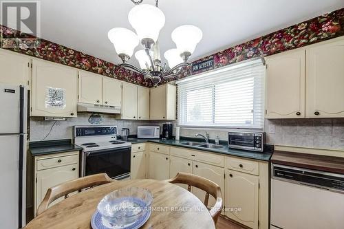 4356 Dublin Crescent, Burlington, ON - Indoor Photo Showing Kitchen With Double Sink