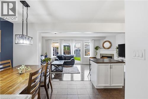 258 Fall Fair Way, Binbrook, ON - Indoor Photo Showing Dining Room With Fireplace