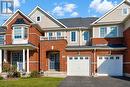 Three Bedroom Townhome in Vibrant Alton Village! - 3221 Sharp Road, Burlington, ON  - Outdoor With Facade 