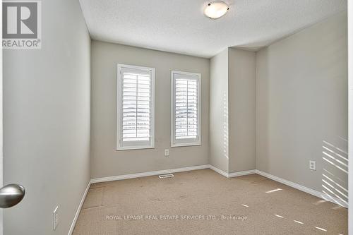 Third Bedroom w/Broadloom & California Shutters - 3221 Sharp Road, Burlington, ON - Indoor Photo Showing Other Room