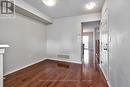 Living Room Boasts Gleaming Hardwood Flooring - 3221 Sharp Road, Burlington, ON  - Indoor Photo Showing Other Room 