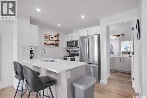 9 651 Dubois Crescent, Saskatoon, SK - Indoor Photo Showing Kitchen With Stainless Steel Kitchen With Double Sink With Upgraded Kitchen