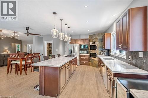 156 St Johns Road W, Simcoe, ON - Indoor Photo Showing Kitchen With Double Sink