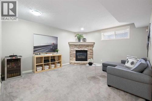 Basement Rec Room with gas fireplace - 71 Chaparral Grove Se, Calgary, AB 