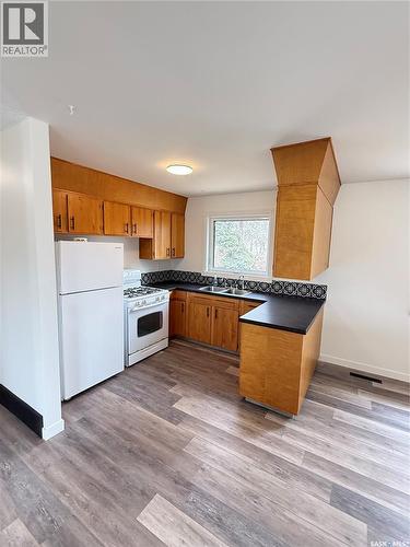 805 Stanley Street, Esterhazy, SK - Indoor Photo Showing Kitchen With Double Sink