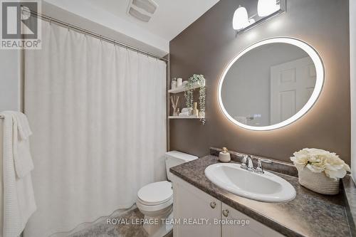 Hardwird vanity mirror w/ lighting - 599 Foxlight Circle, Ottawa, ON - Indoor Photo Showing Bathroom