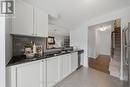 Upgraded backsplash - 599 Foxlight Circle, Ottawa, ON  - Indoor Photo Showing Kitchen With Double Sink With Upgraded Kitchen 