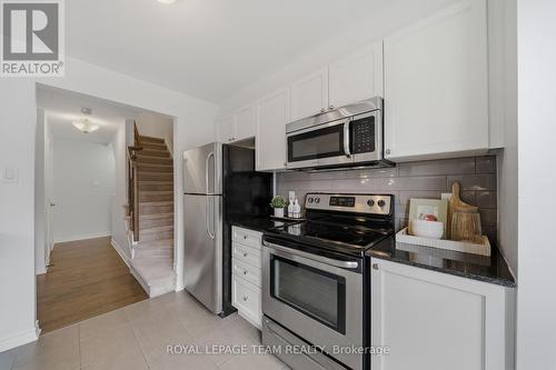 Stainless steel appliances - 599 Foxlight Circle, Ottawa, ON - Indoor Photo Showing Kitchen With Stainless Steel Kitchen With Upgraded Kitchen