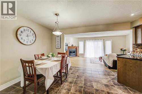 330 Dearborn Boulevard Unit# 7, Waterloo, ON - Indoor Photo Showing Dining Room With Fireplace
