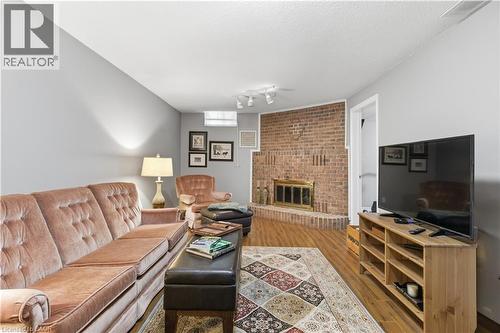 125 Covington Crescent, Kitchener, ON - Indoor Photo Showing Living Room With Fireplace