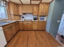 246 Battleford Trail, Swift Current, SK  - Indoor Photo Showing Kitchen With Double Sink 