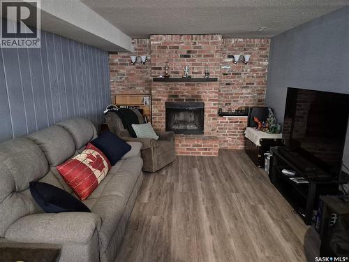 246 Battleford Trail, Swift Current, SK - Indoor Photo Showing Living Room With Fireplace