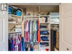 Primary closet with upgraded organizer - 