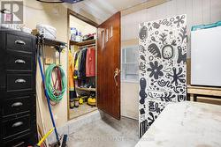 Storage room off garage. - 