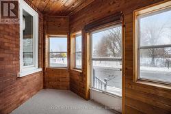 Covered and screen-in front porch. - 
