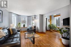Bright living room overlooking the canal. - 