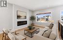 175 Gillies Lane, Saskatoon, SK  - Indoor Photo Showing Living Room With Fireplace 