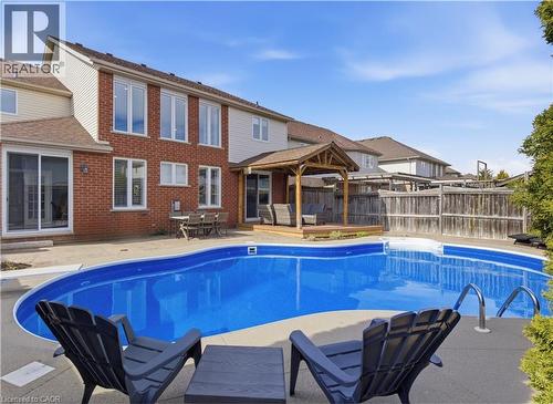 309 Schooner Crescent, Waterloo, ON - Outdoor With In Ground Pool