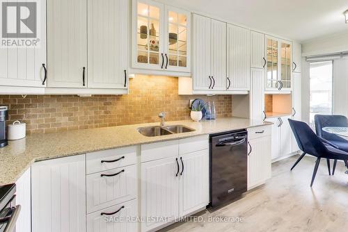 4208 Stonemason Crescent, Mississauga, ON - Indoor Photo Showing Kitchen With Double Sink