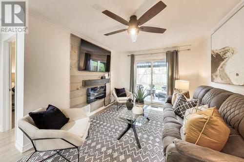 4208 Stonemason Crescent, Mississauga, ON - Indoor Photo Showing Living Room With Fireplace