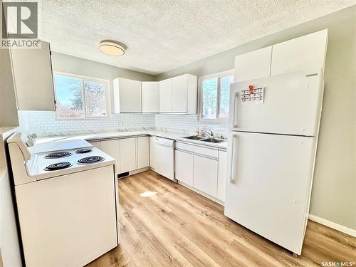 624 7Th Street E, Prince Albert, SK - Indoor Photo Showing Kitchen With Double Sink