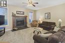 414 Perreault Lane, Saskatoon, SK  - Indoor Photo Showing Living Room With Fireplace 