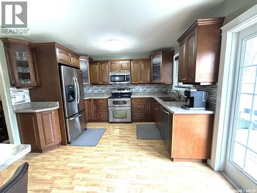 414 Perreault Lane, Saskatoon, SK - Indoor Photo Showing Kitchen With Double Sink