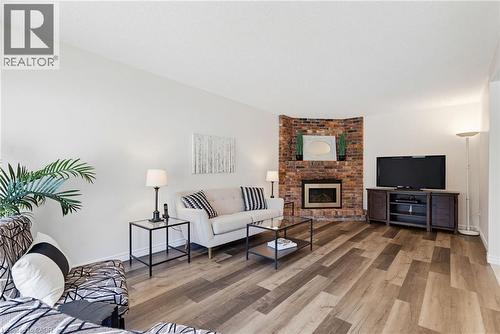 106 Maple Drive, Hamilton, ON - Indoor Photo Showing Living Room With Fireplace