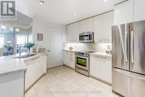 Kitchen - 404 - 80 Palace Pier Court, Toronto, ON - Indoor Photo Showing Kitchen With Double Sink With Upgraded Kitchen