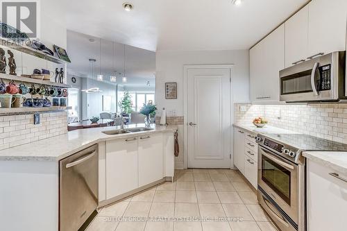Renovated Kitchen - 404 - 80 Palace Pier Court, Toronto, ON - Indoor Photo Showing Kitchen With Double Sink With Upgraded Kitchen