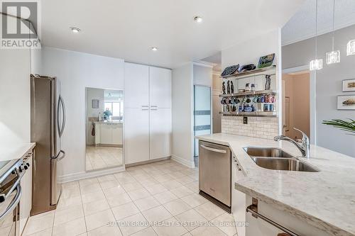 404 - 80 Palace Pier Court, Toronto, ON - Indoor Photo Showing Kitchen With Double Sink