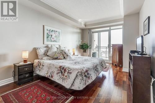 Primary Bedroom with W/O to Balcony - 404 - 80 Palace Pier Court, Toronto, ON - Indoor Photo Showing Bedroom