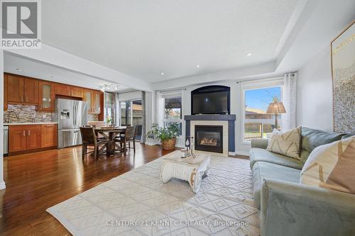 1644 Samuelson Circle, Mississauga, ON - Indoor Photo Showing Living Room With Fireplace