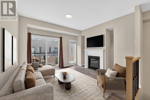 Virtually Staged - 45 Winters Crescent, Collingwood, ON - Indoor Photo Showing Living Room With Fireplace