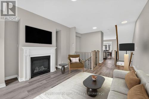 Virtually Staged - 45 Winters Crescent, Collingwood, ON - Indoor Photo Showing Living Room With Fireplace