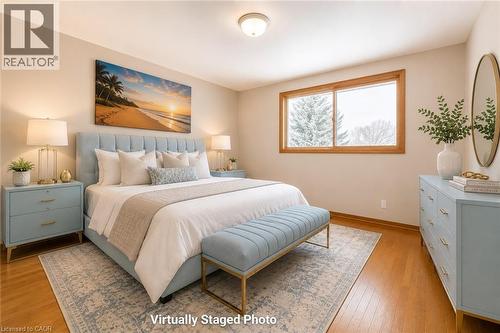 Wood-finish flooring throughout - 66 Summit Avenue, Kitchener, ON - Indoor Photo Showing Bedroom