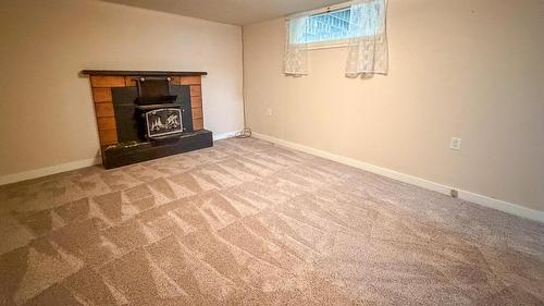 811 28Th Avenue, Cranbrook, BC - Indoor With Fireplace