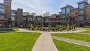 2303-7343 Okanagan Landing Road, Vernon, BC  - Outdoor With Facade 
