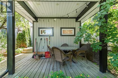 Covered wooden deck featuring recessed lighting and string lights - 134 Erie Avenue, Hamilton, ON 