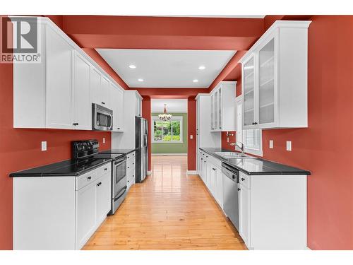 Kitchen - 479 Middleton Way, Coldstream, BC - Indoor Photo Showing Kitchen With Upgraded Kitchen