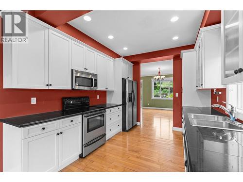 479 Middleton Way, Coldstream, BC - Indoor Photo Showing Kitchen With Double Sink