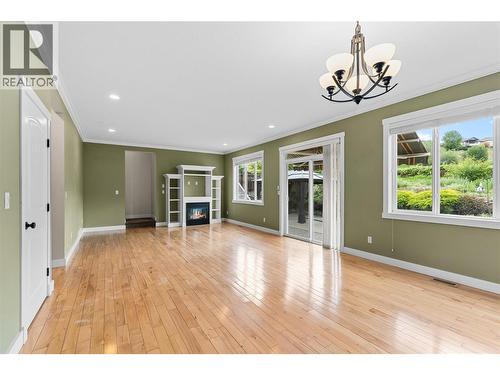 479 Middleton Way, Coldstream, BC - Indoor Photo Showing Other Room With Fireplace