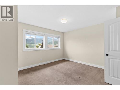 Bedroom # 2 - 479 Middleton Way, Coldstream, BC - Indoor Photo Showing Other Room