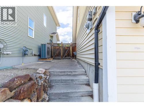 Side entrance - 479 Middleton Way, Coldstream, BC - Outdoor With Exterior