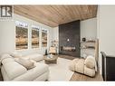 1437 April Springs Court, Kelowna, BC  - Indoor Photo Showing Living Room With Fireplace 