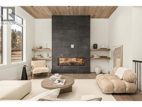 1437 April Springs Court, Kelowna, BC - Indoor Photo Showing Living Room With Fireplace