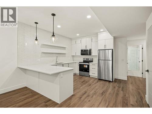 1437 April Springs Court, Kelowna, BC - Indoor Photo Showing Kitchen With Upgraded Kitchen
