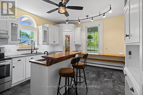 SLEEK KITCHEN WITH ISLAND - 1663 5Th Avenue E, Owen Sound, ON 