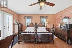 Main floor bedroom with 3-piece ensuite - 