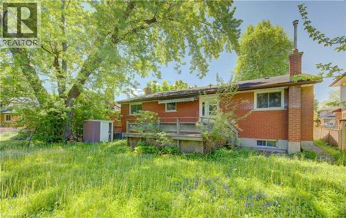Red brick exterior with a large rear yard - 80 Lower Canada Crescent, Kitchener, ON 